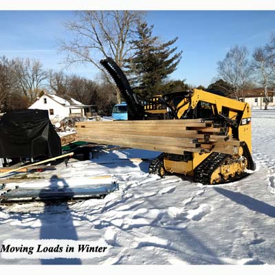 Moving  kiln wood in Winter.